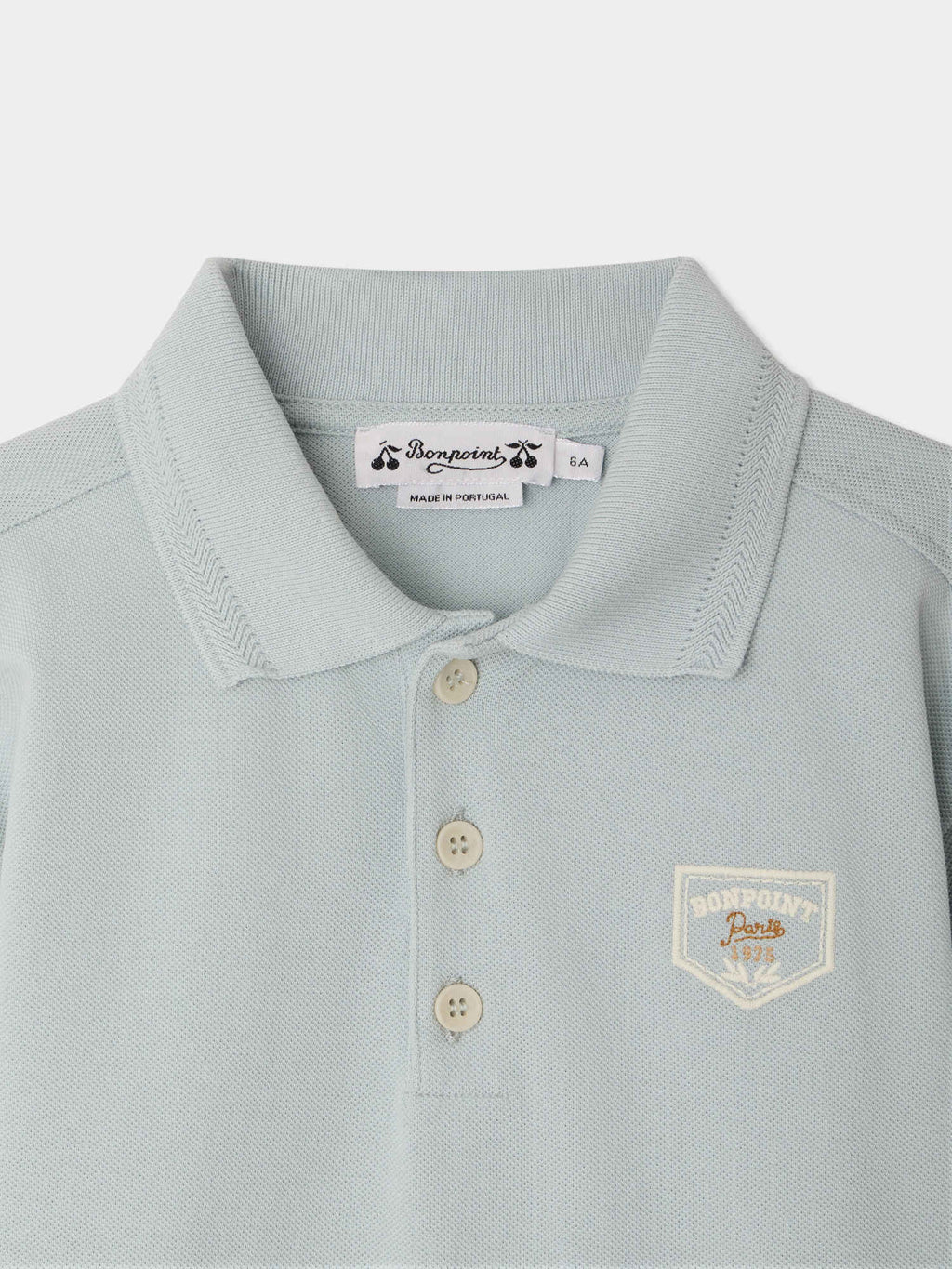 polo brodé en coton biologique bleu aqua