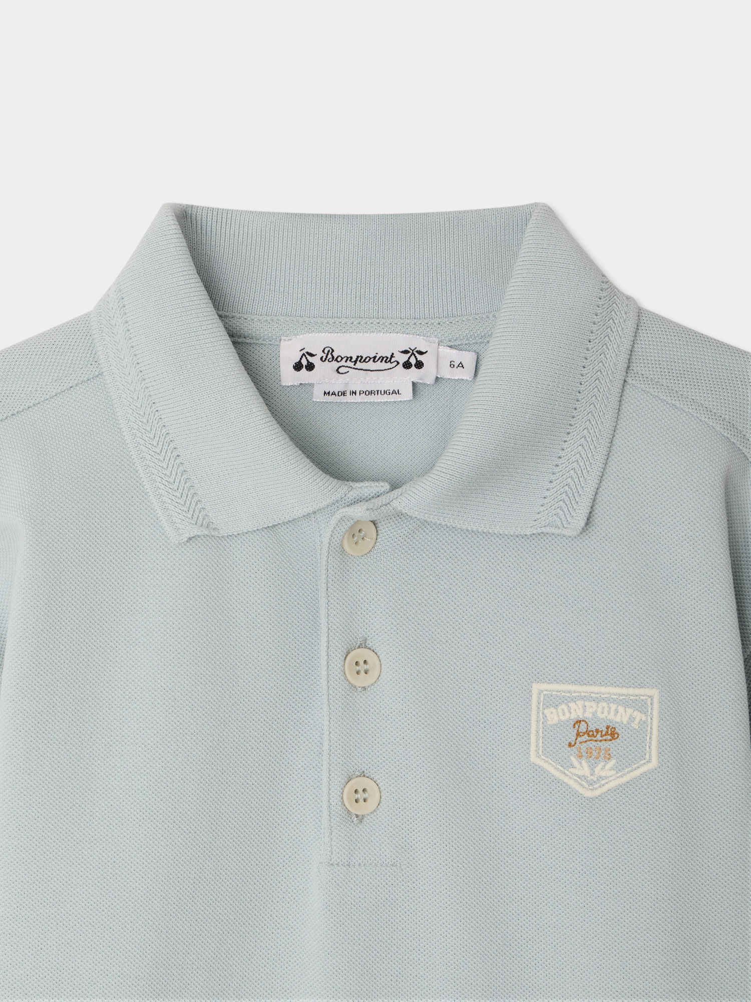 polo brodé en coton biologique bleu aqua